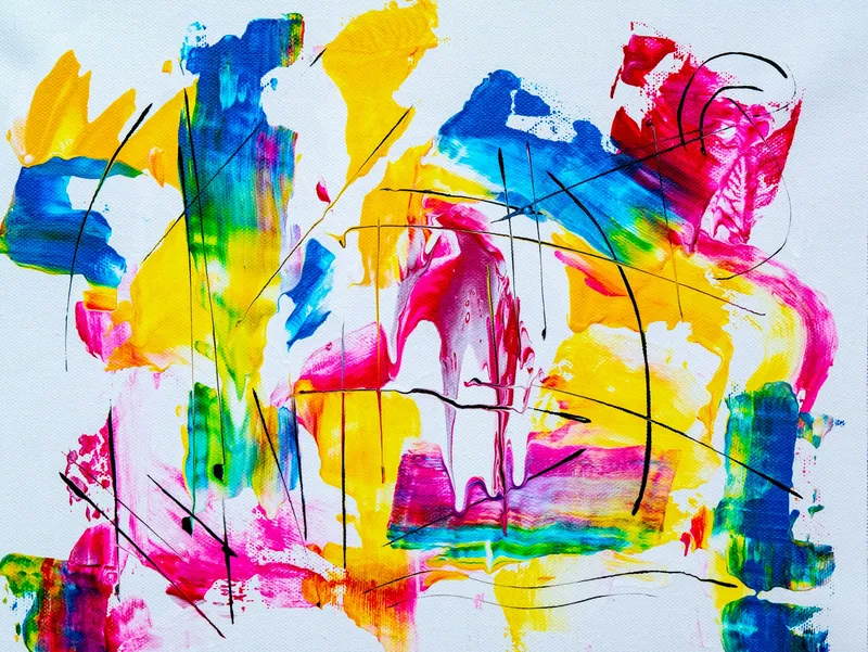Abstract painting with bold strokes of yellow, pink, blue and red paint on white